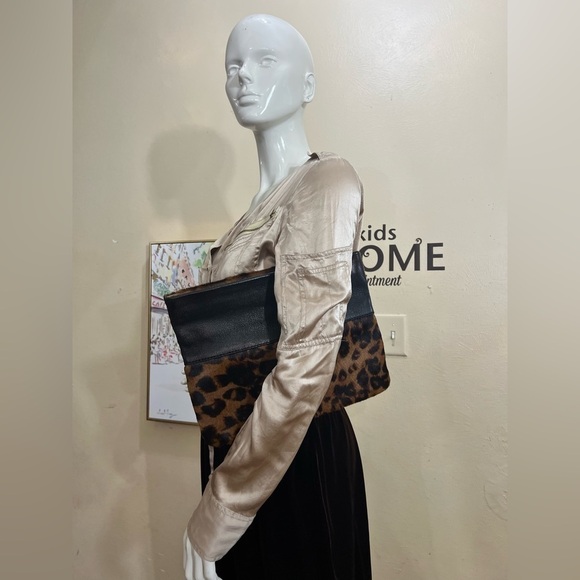 ANTONIO MELANI Handbags - ANTONIO MELANI pony hair and leather clutch